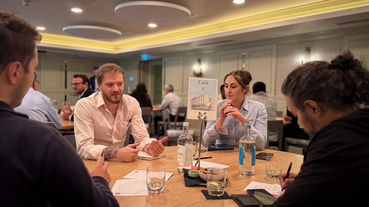 Founders and investors talking at an Entrepreneurs Collective pitch event